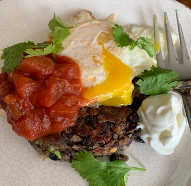 black bean burger with runny egg, salsa and cilantro