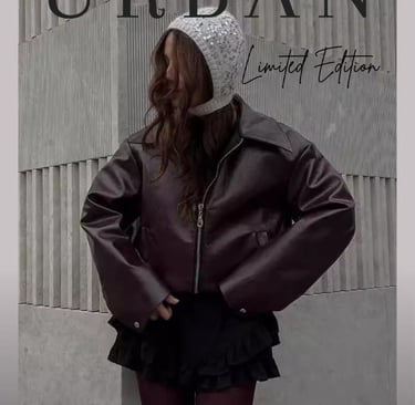 poster of girl standing in a leather jacket