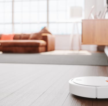 a robot vacuum cleaner is on the floor