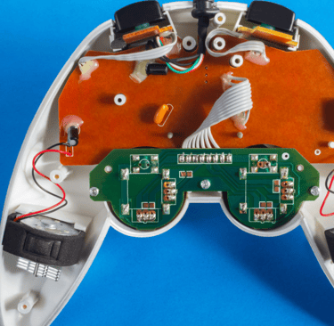 a white and green electronic device with a bird on it