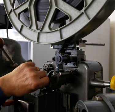 a man working on a machine in a factory