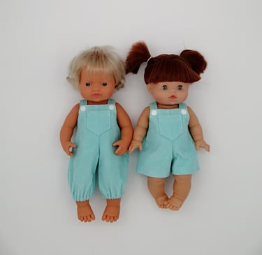 Miniland doll and Minikane doll dressed in handmade overalls