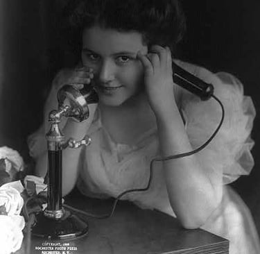 a woman in a dress and a microphone in a microphone
