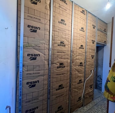 Isolation intérieure d'un mur avec un matériel laine