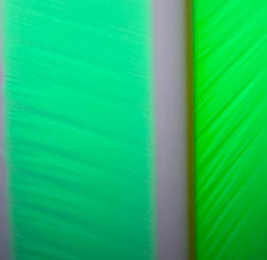 a green and white light on a table