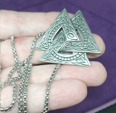 a talisman of Odin's symbol with a necklace
