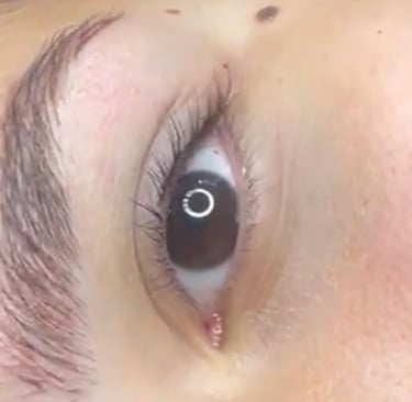 a woman with a piercings on her eye Sol Contreras