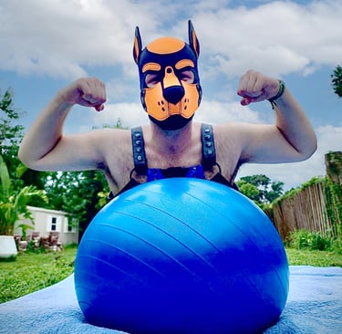 A man playing outside with a ball wearing a pup mask and gear.