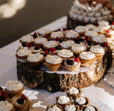 Selection of cupcakes shown as part of a rustic dessert bar in Bozeman Montana