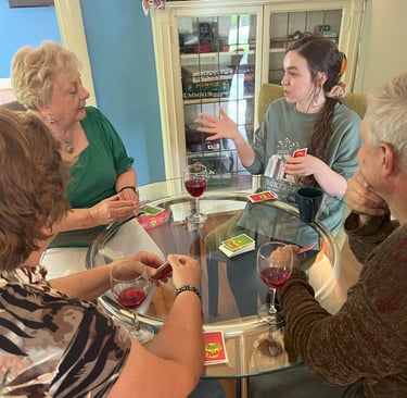 group playing cards at Main Street House