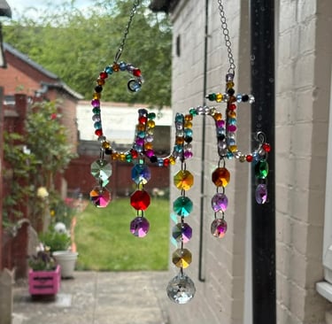 A Random Rainbow Cunt catcher in its new home with a fellow sweary business, Swears of Joy