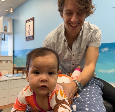 Franklin chiropractor adjusting baby for tongue tie, natural relief