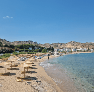 sunbeds and umbrellas in Rhodes beach