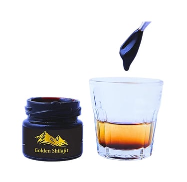 a spoon of golden shilajit resin 