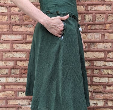 Knee length green skirt