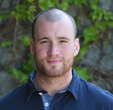 a man in a blue shirt and a blue shirt