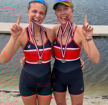 Maija and Anna Andert wearing their gold medals for their win in the pair at the American Youth Cup