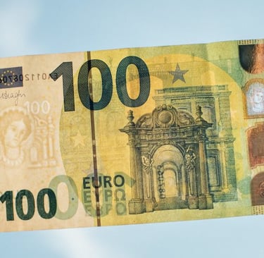 a person holding a bank note with a 100, 000 note note