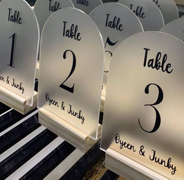 Array of clear Acrylic Table Numbers with bold black script for tables 1 to 5 and VIP precision cut