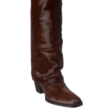 a pair of Fendi boots with a brown leather boot