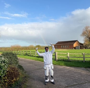A staff member posing outside a property.