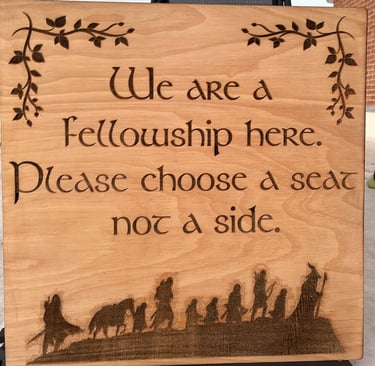 laser cut and engraved lotr fellowship wooden sign for a wedding
