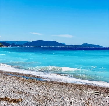 a beach with a surfboard and a surfboard
