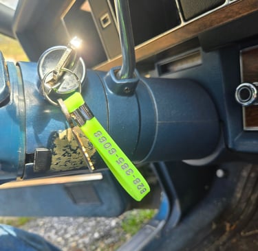 Jack’s Locksmith key in classic car ignition representing expertise in key cutting and vintage key cutting in Swannanoa, NC