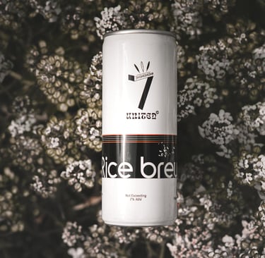 7 united rice beer in an Aluminium can with a floral backdrop