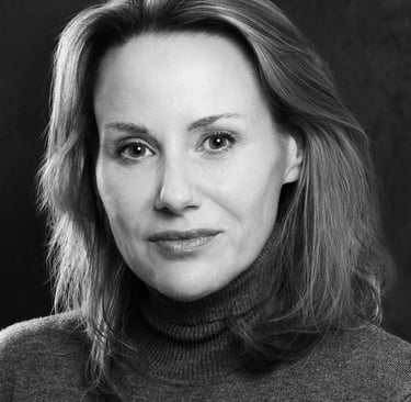 a woman in a turtle neck sweater and turtle neck sweater