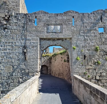 a stone wall with a clock on it