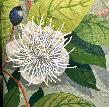 Gros plan sur une peinture murale acrylique lessivable représentant une fleur de myrte