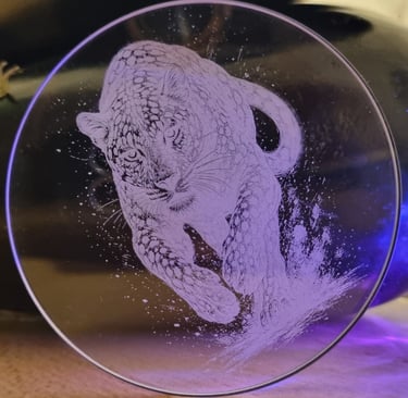 a glass plate with a picture of a leopard