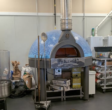large wood pizza oven at whalehead brewery