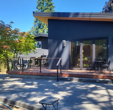 home addition with rear hardwood deck
