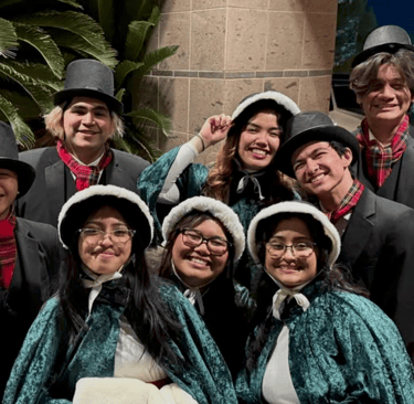 Las Vegas Christmas carolers in caroling garb