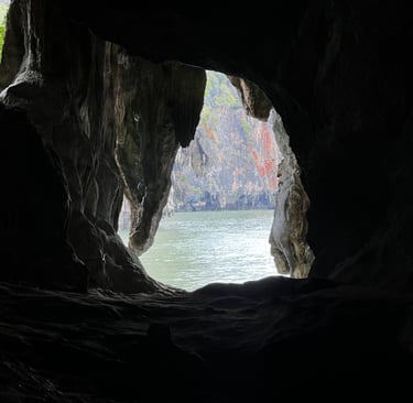 a hole at the end of a cave looks out at the Andaman Sea