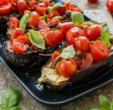 Ricetta semplici e genuina - Bruschetta di Melanzane con pomodorini, olive e capperi