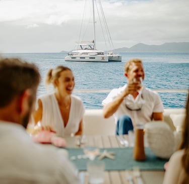a group of people sitting around a table
