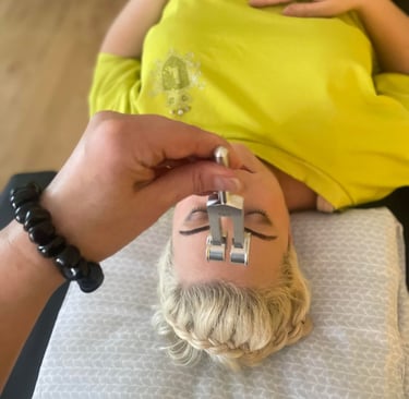 a woman during saound therapy session