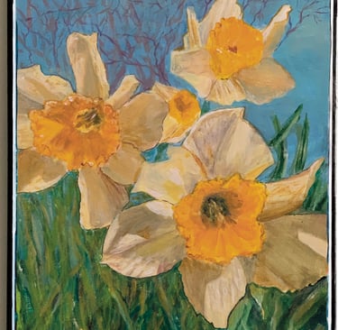Closeup of three Daffodils in the bright sunshine