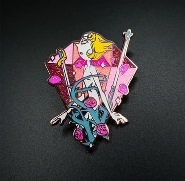 a glittered hard enamel pin