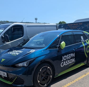 lime green printed vinyl wrap applied to a electric cupra