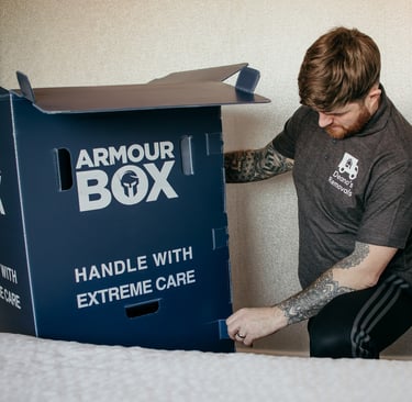 box being carried by deanos removals