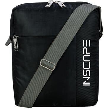 a black and white sling bag with a grey strap