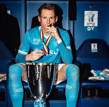a man sitting in a bench with a trophy