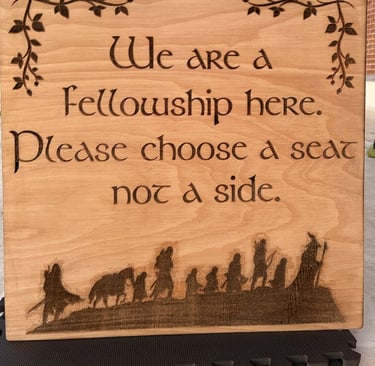 laser cut and engraved lotr fellowship wooden sign for a wedding