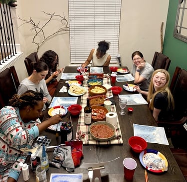 Women enjoying a Ladies’ Night watercolor painting class at Kelley’s Neighborhood Art 