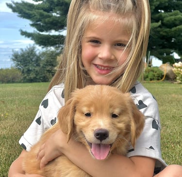 kid with dog golden retriever