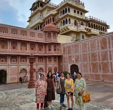 a group of people standing in front of a building